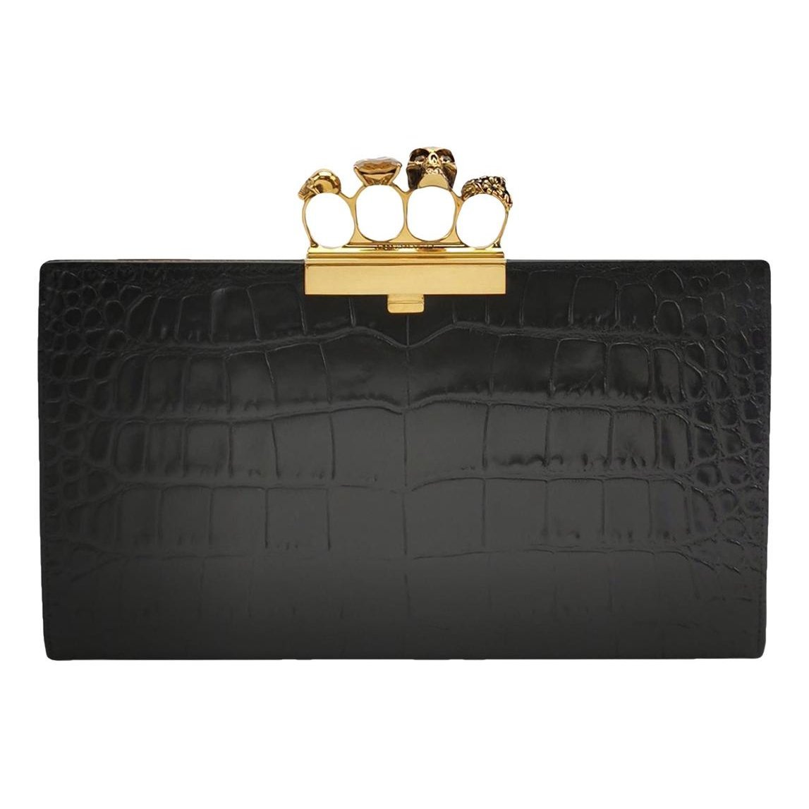 Knuckle leather clutch bag