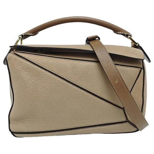 Puzzle leather handbag