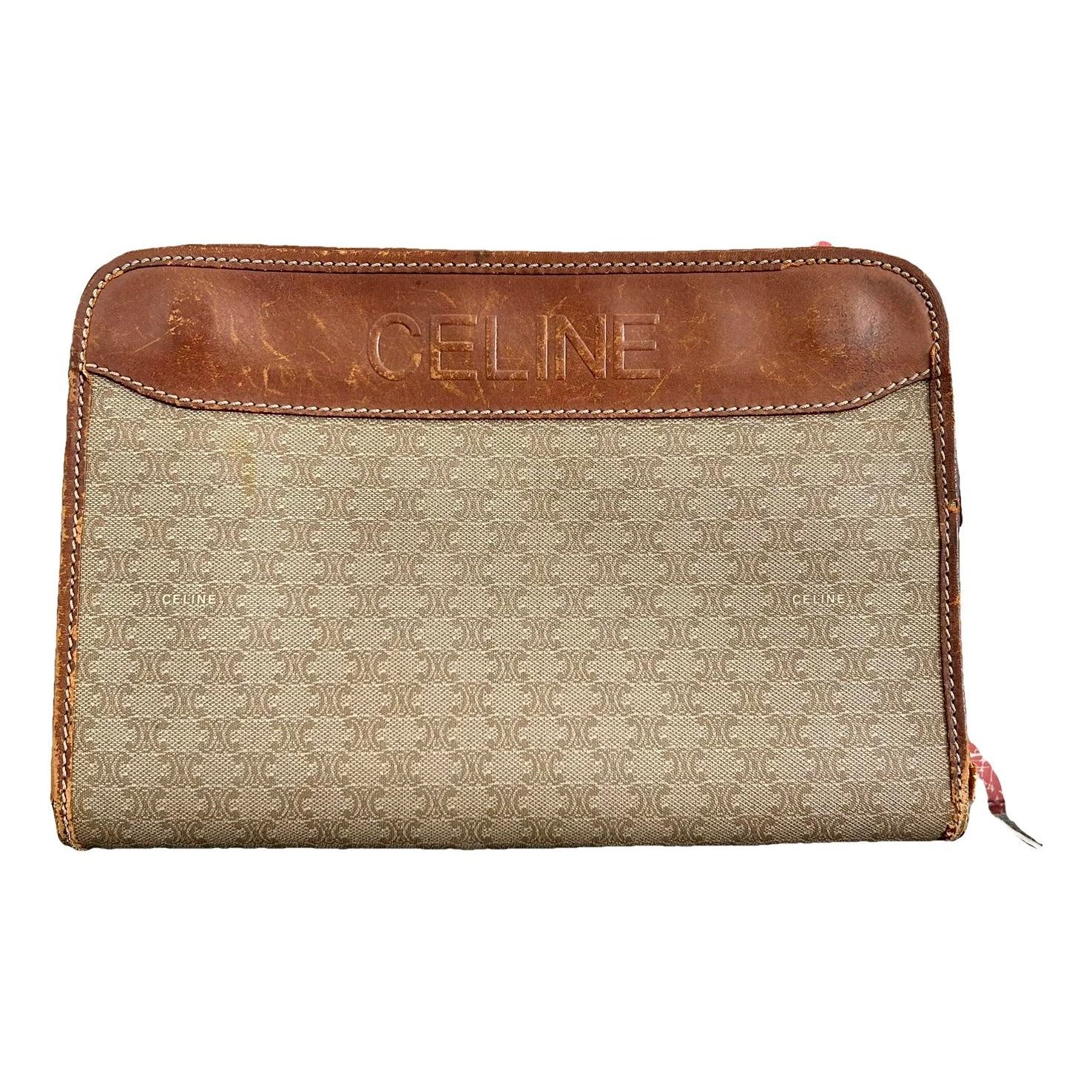 Triomphe Vintage leather clutch bag