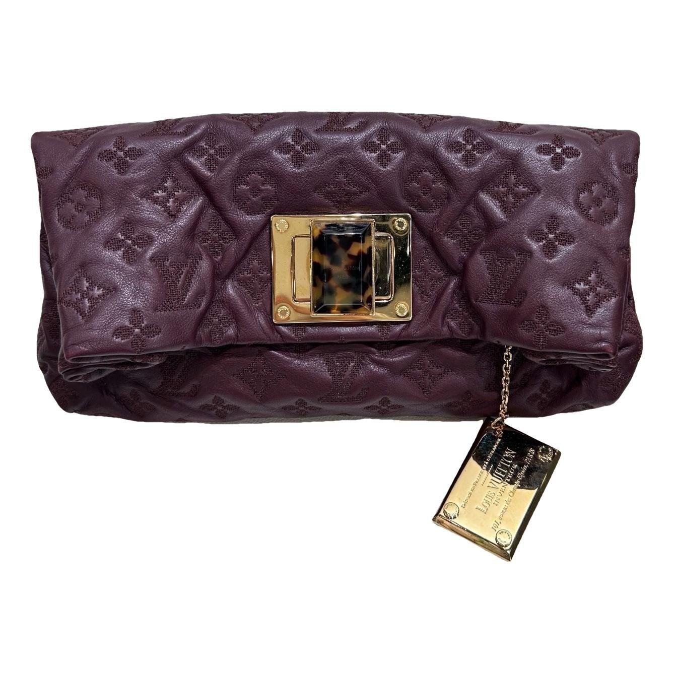 Altair leather clutch bag
