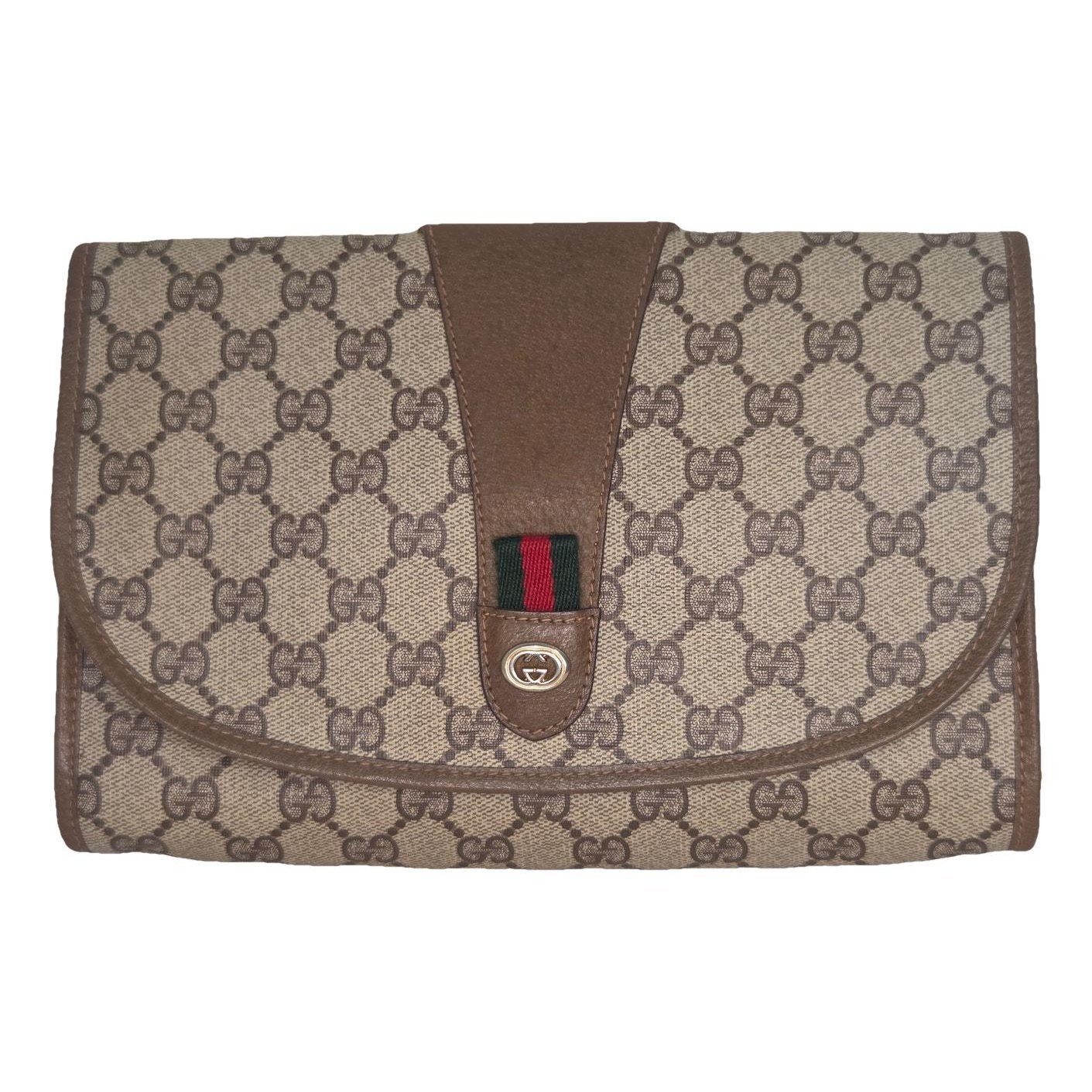 Ophidia leather clutch bag