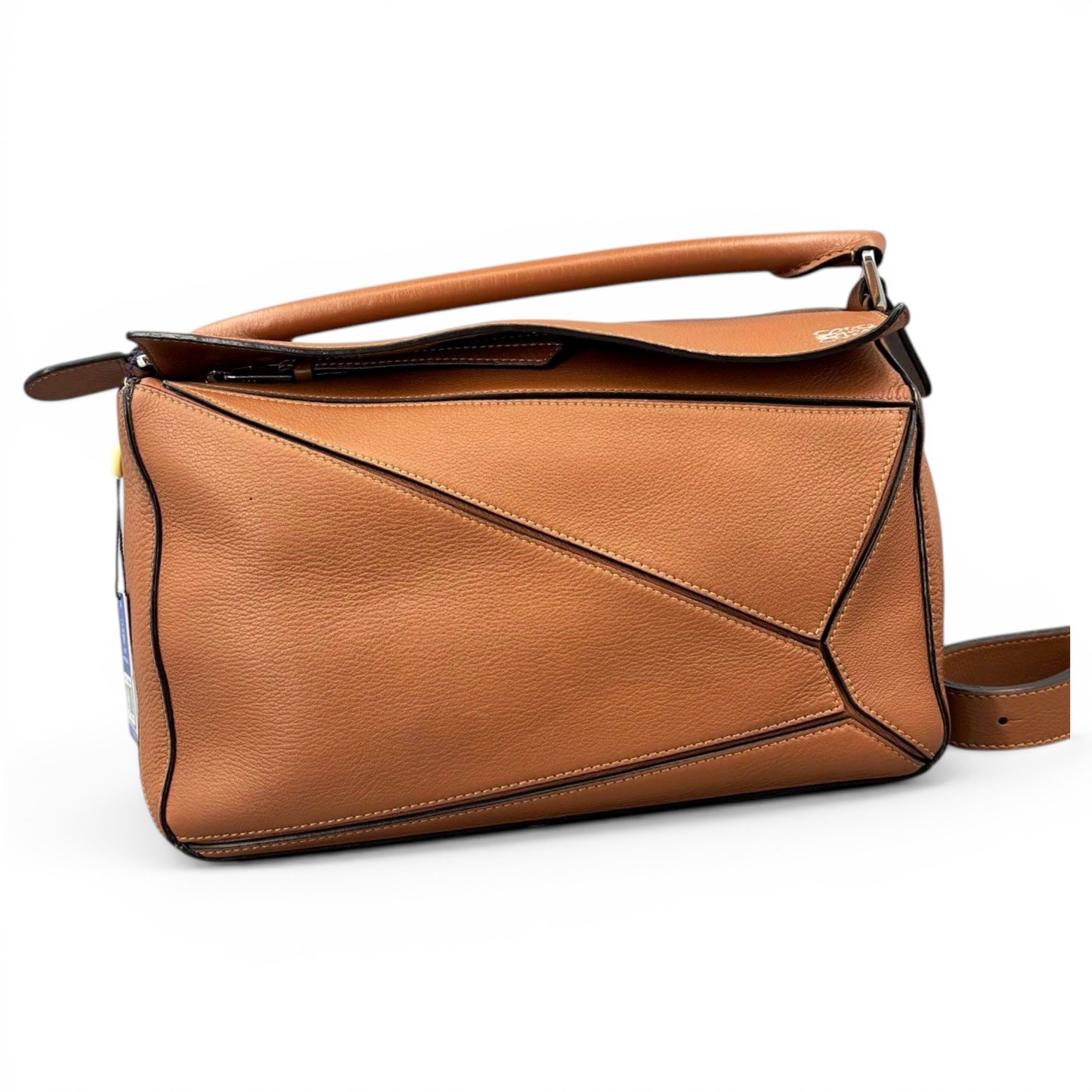 Puzzle leather handbag