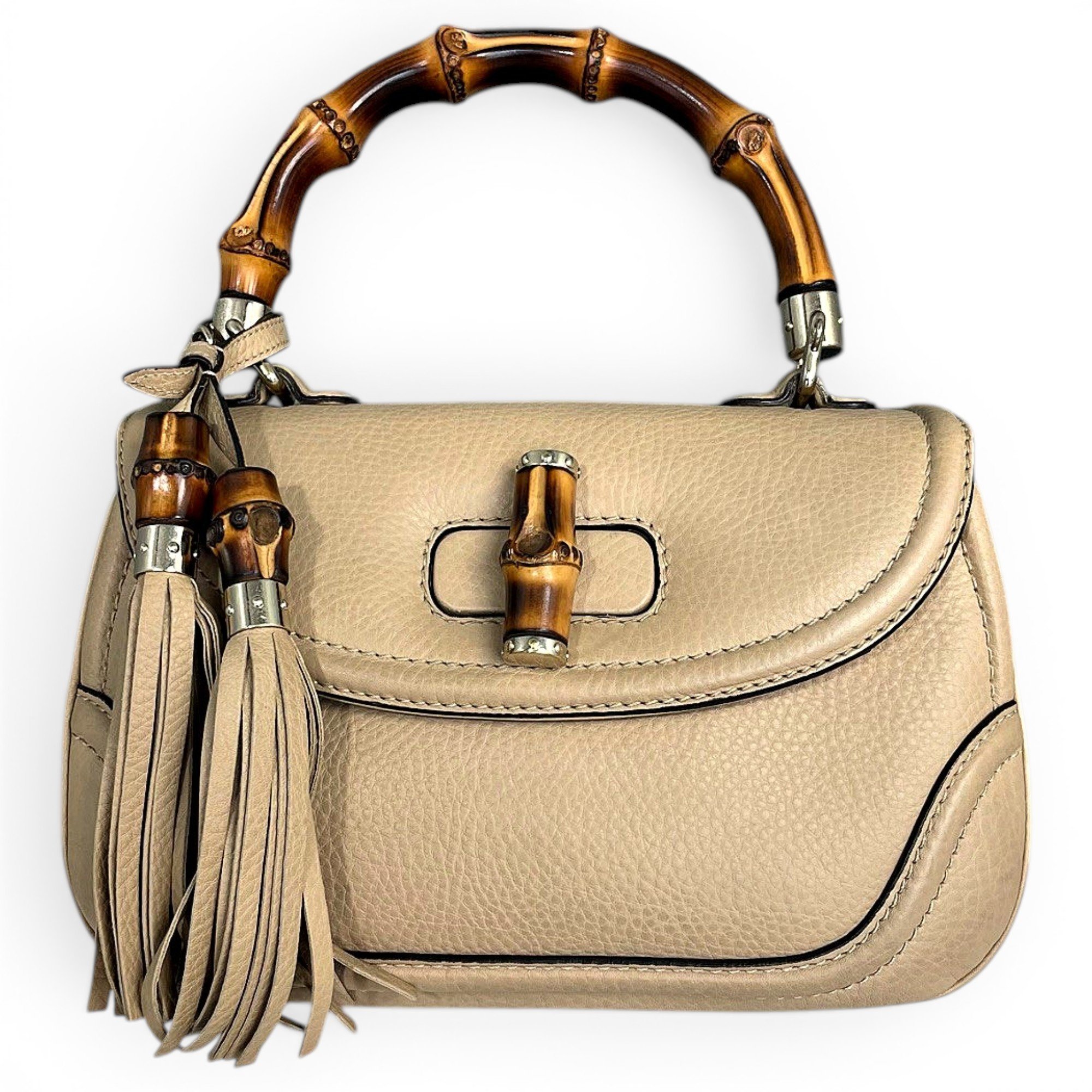 Convertible Pompon Bamboo Top Handle leather handbag