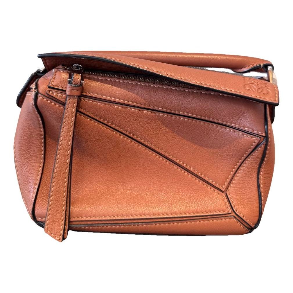 Puzzle leather handbag