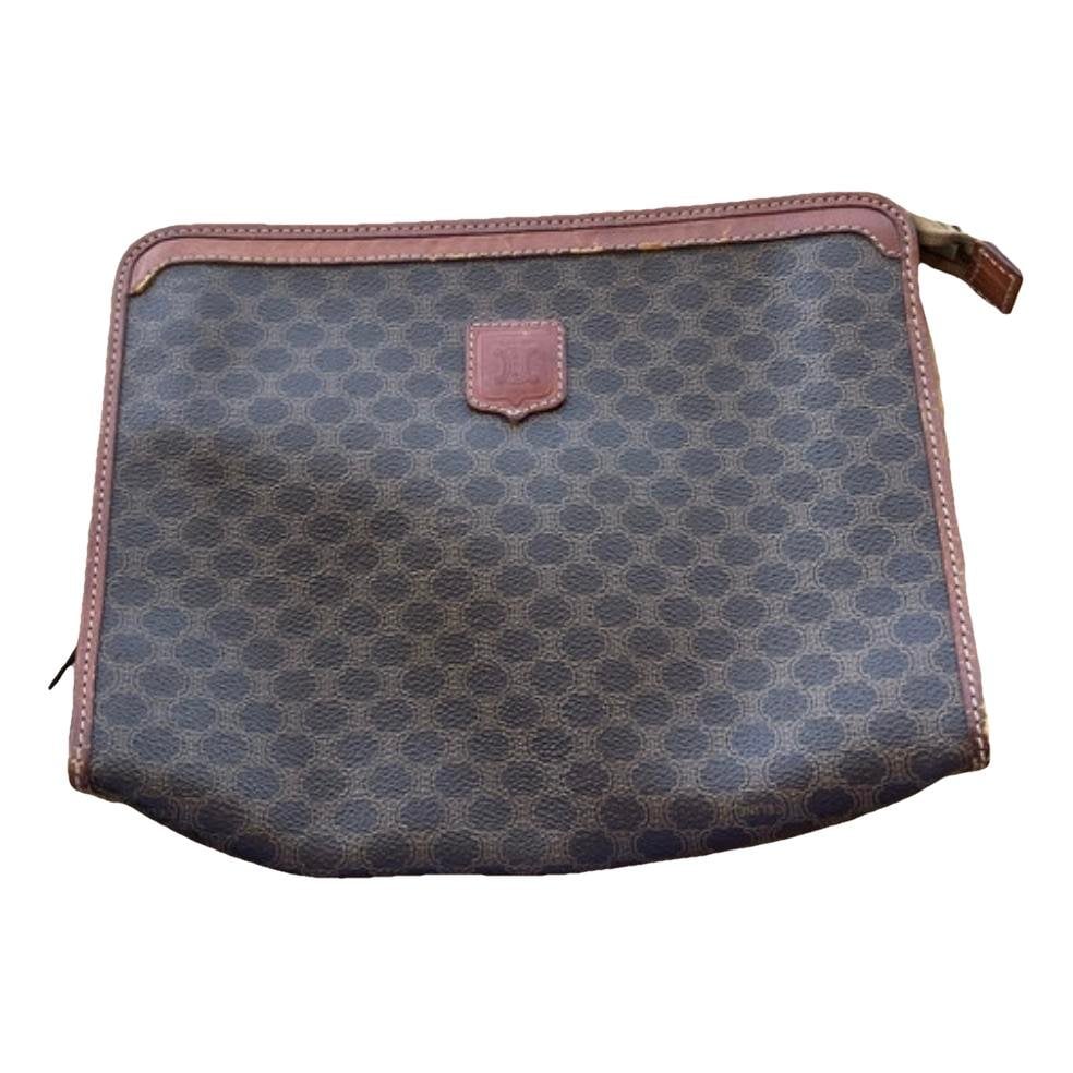 Triomphe Vintage leather clutch bag