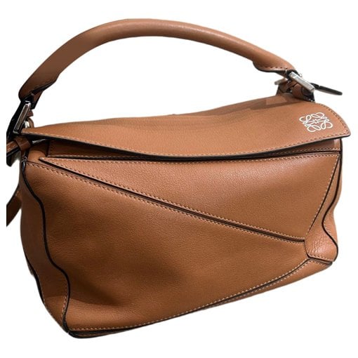 Puzzle leather handbag