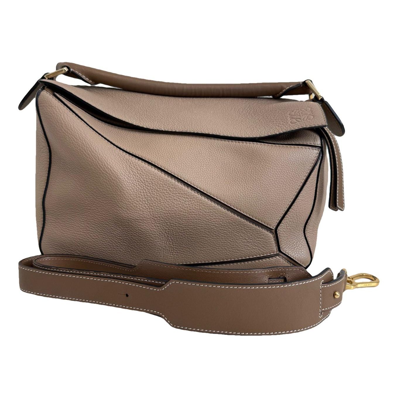 Puzzle leather handbag