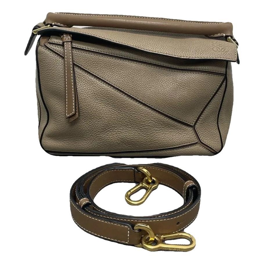 Puzzle leather handbag