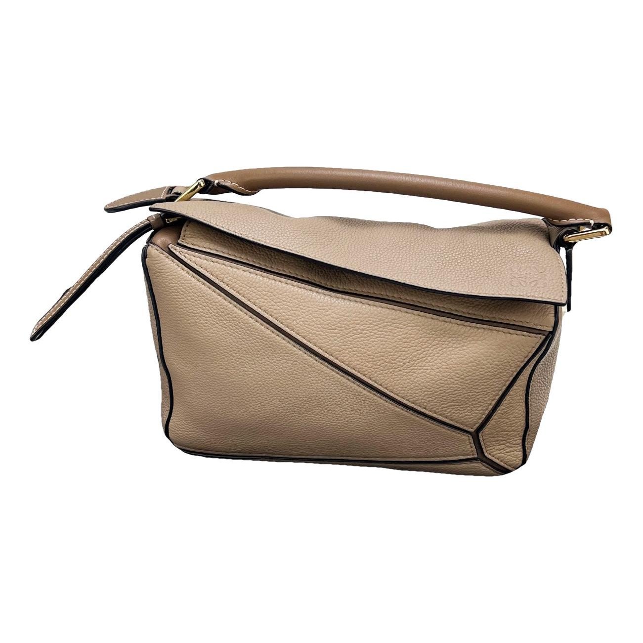 Puzzle leather handbag