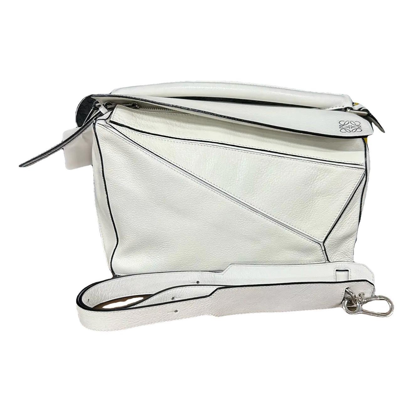 Puzzle leather handbag