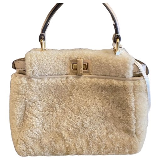 Peekaboo wool handbag