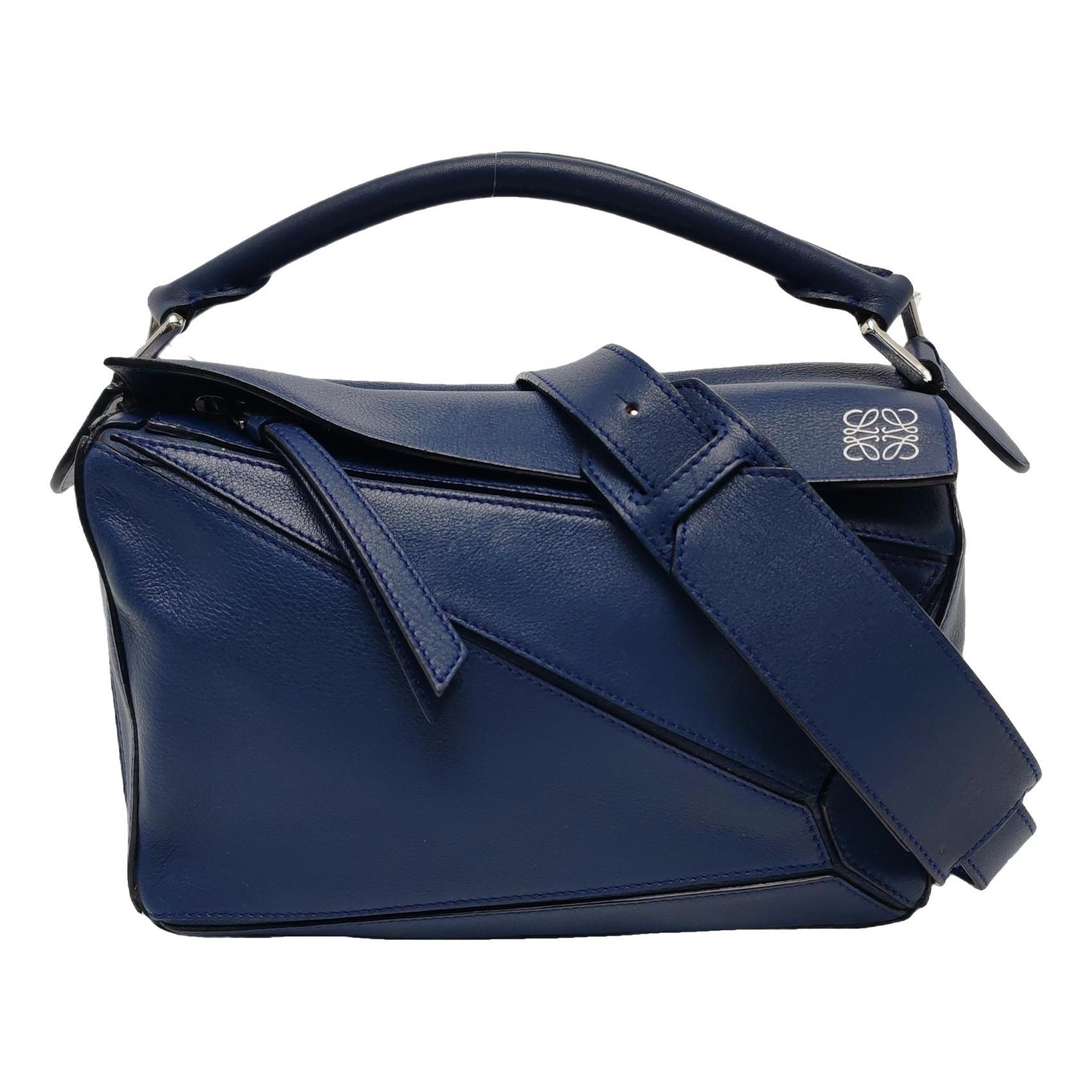 Puzzle leather crossbody bag