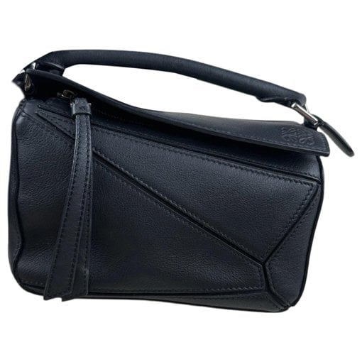 Puzzle leather handbag