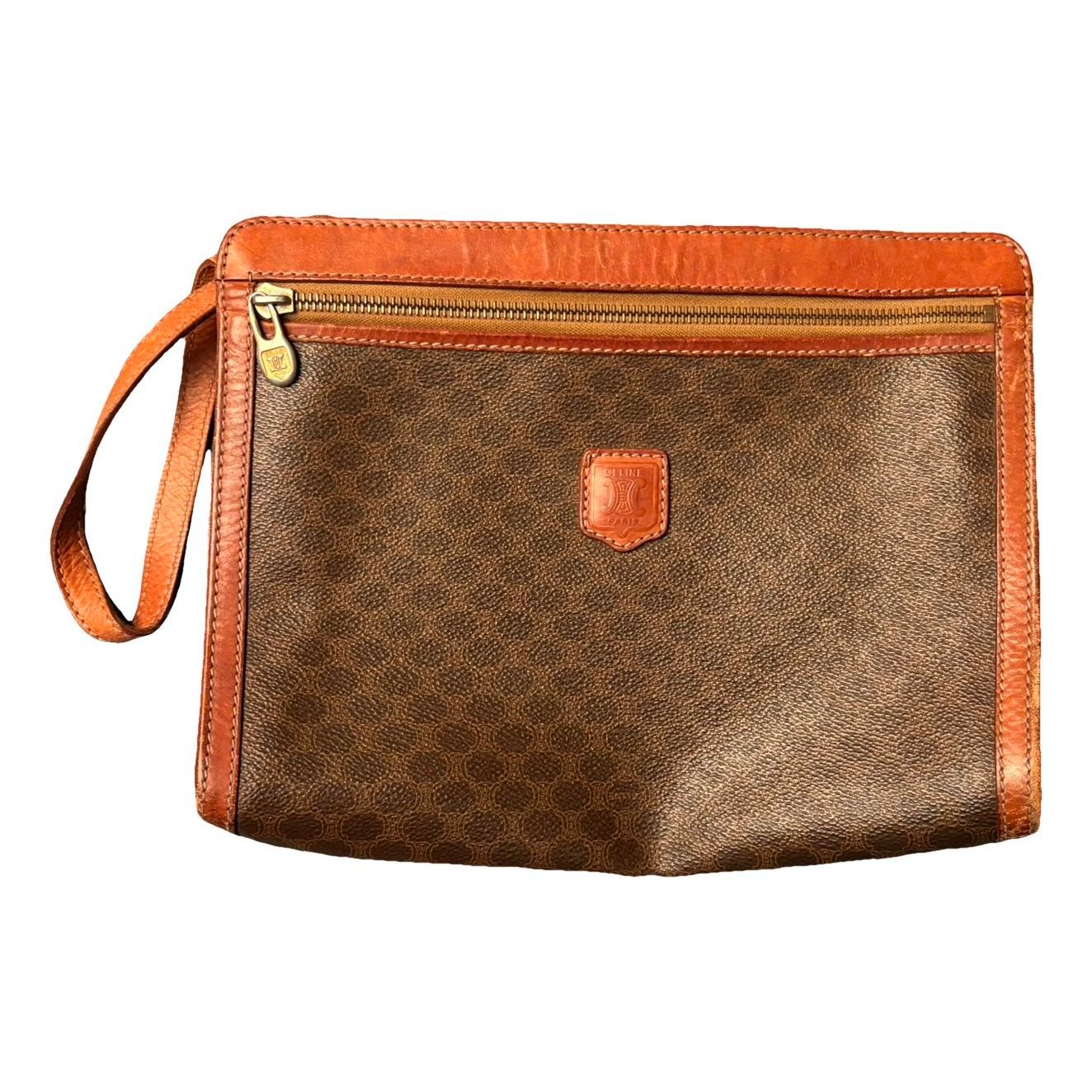 Triomphe Vintage leather clutch bag