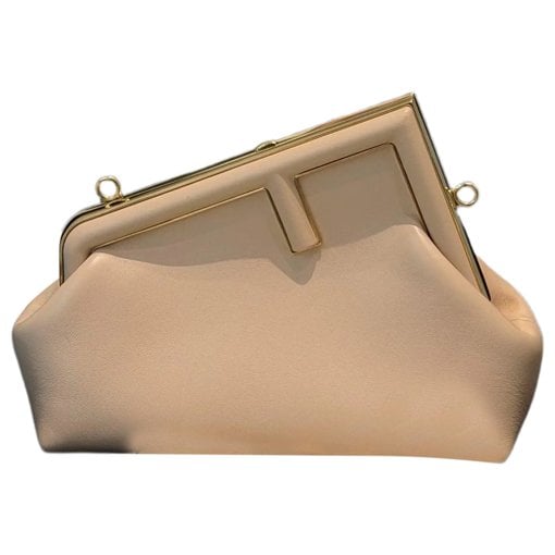 First leather handbag