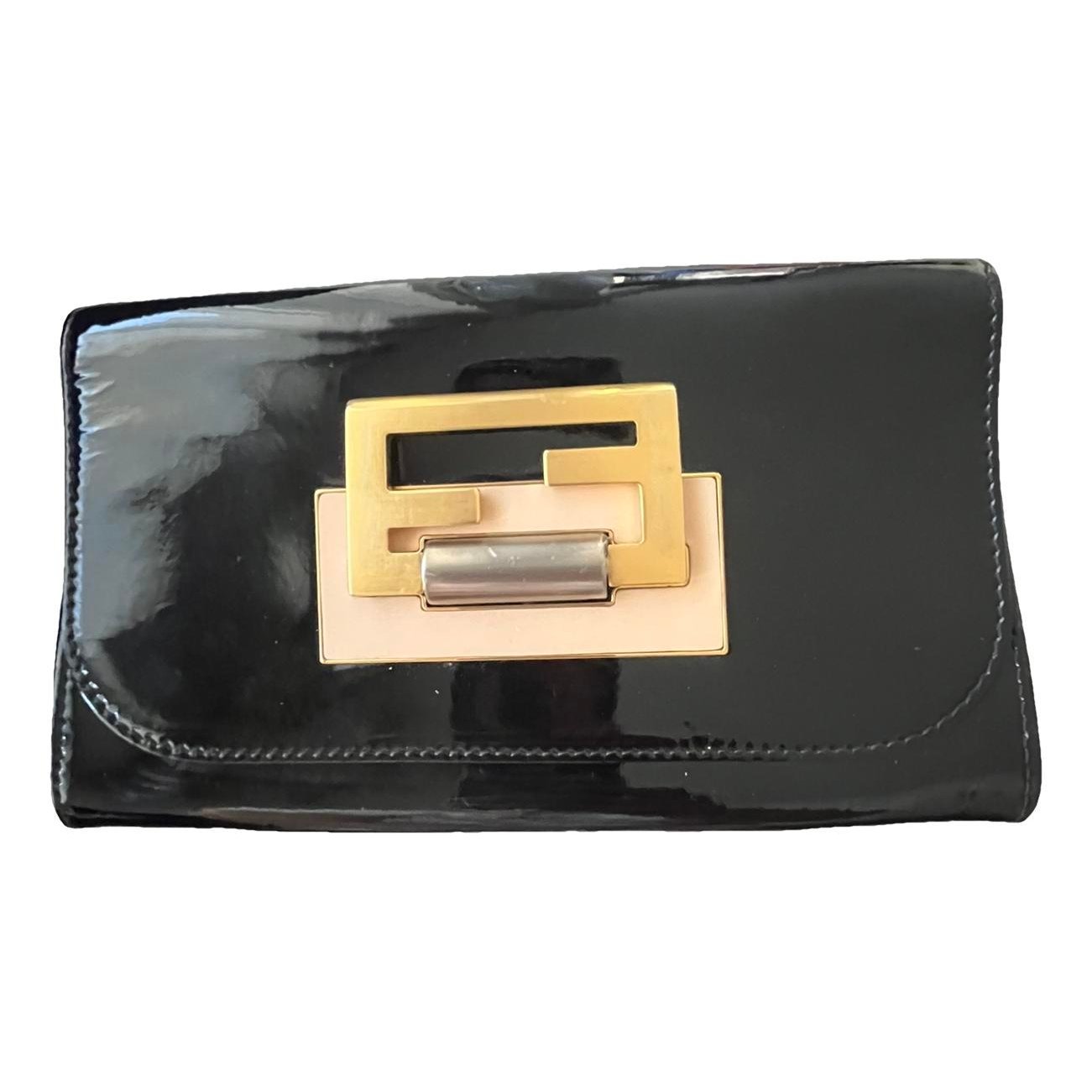 Baguette patent leather handbag
