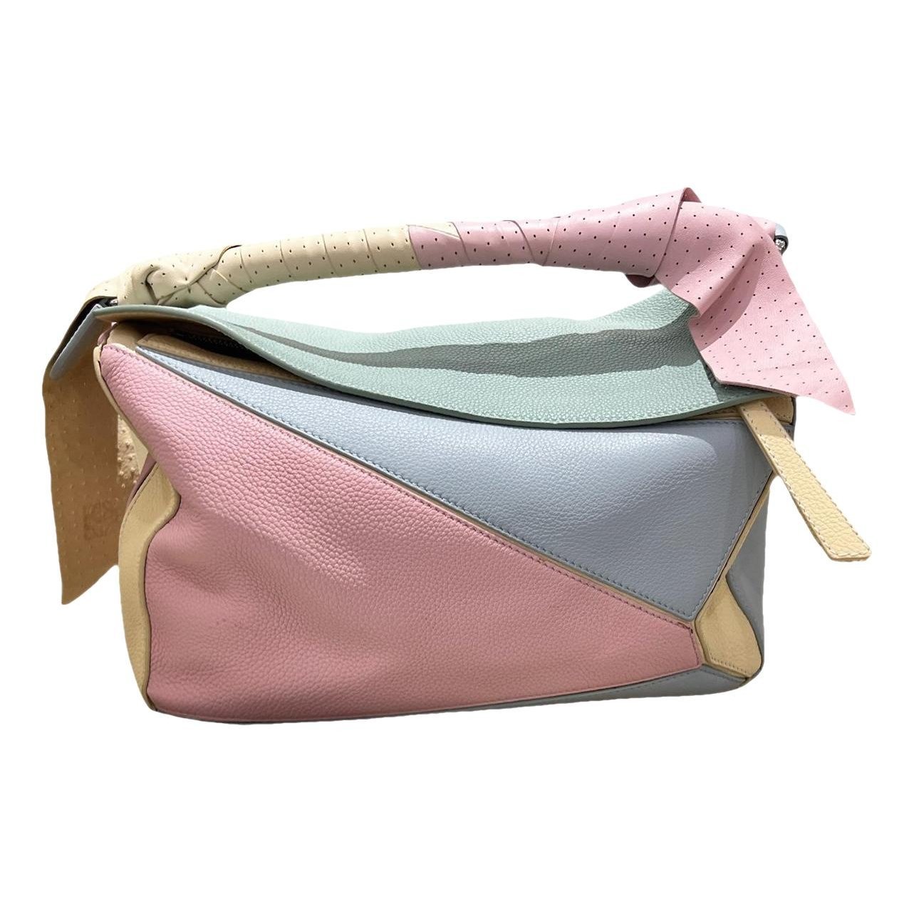 Puzzle leather handbag