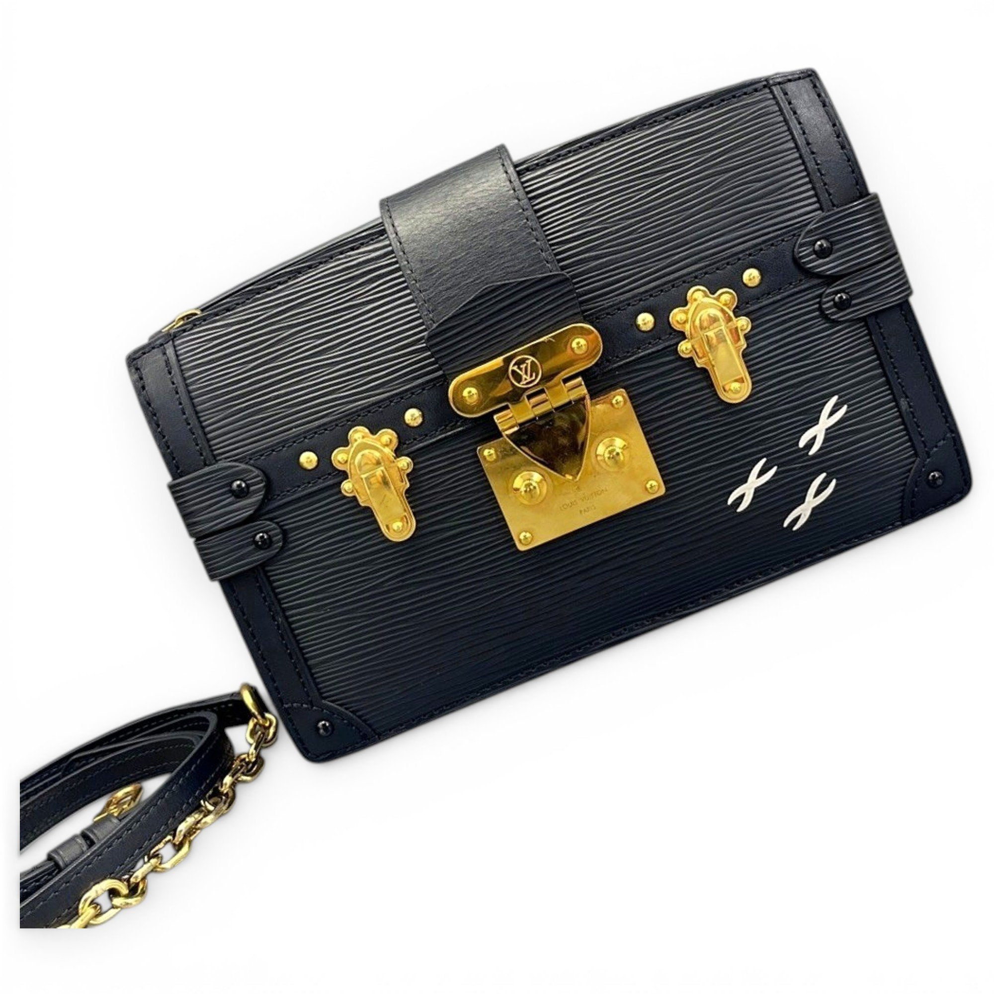 Pochette Trunk leather handbag