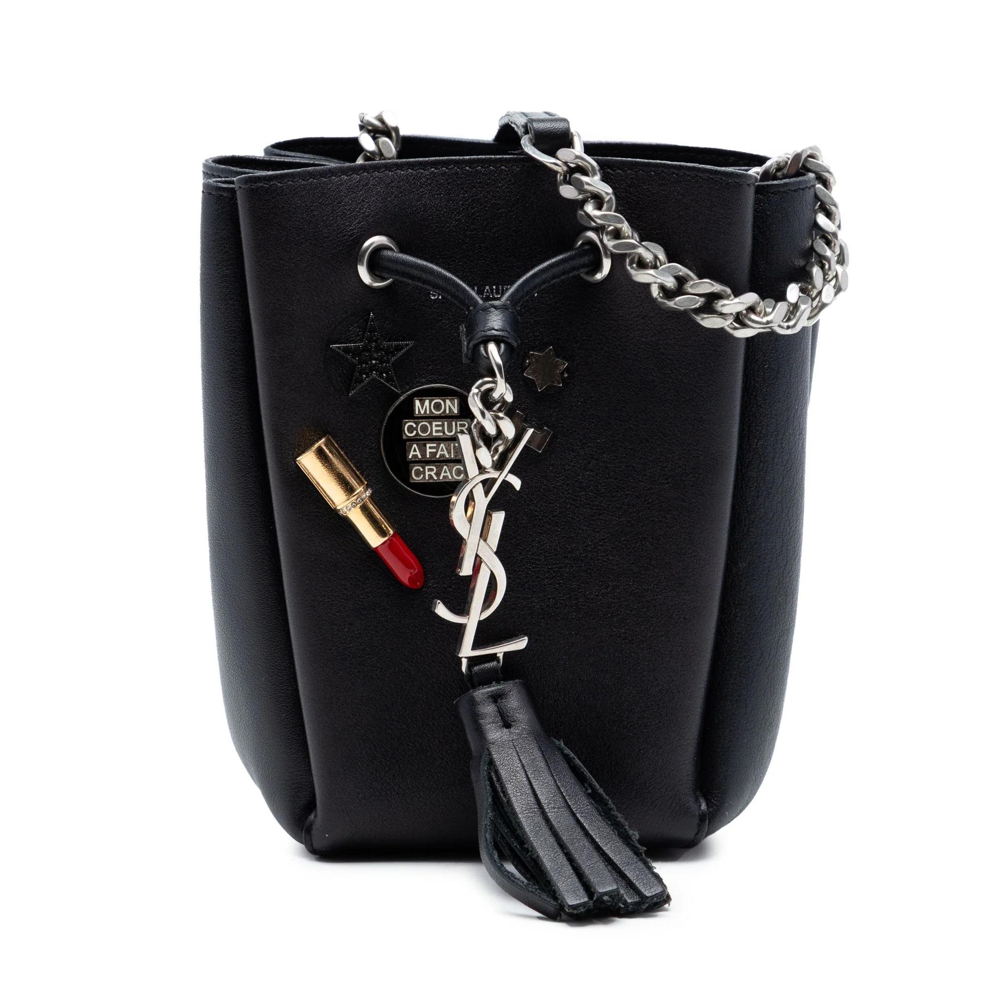 Monogram bucket leather handbag