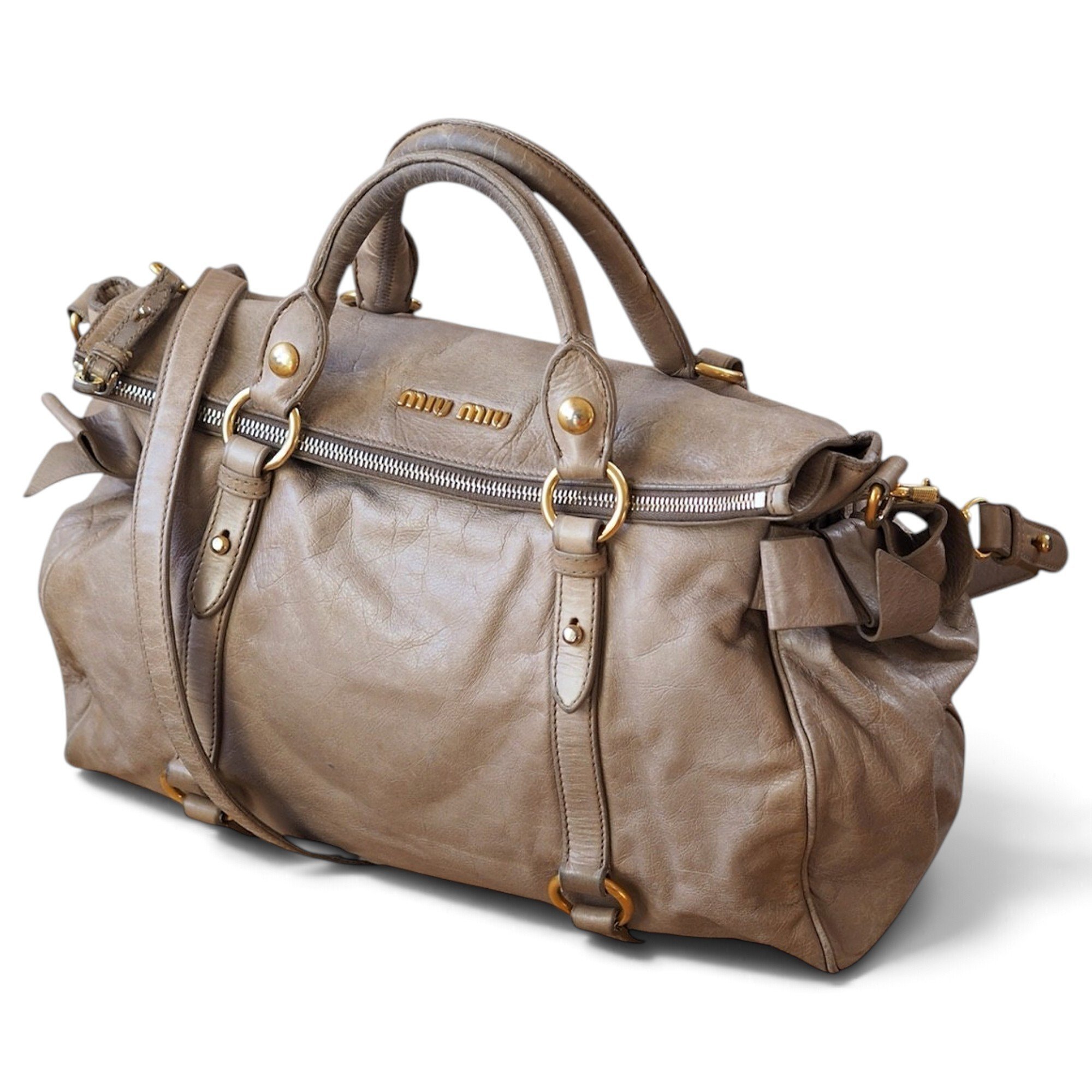 Bow bag leather handbag