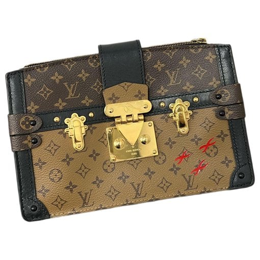 Pochette Trunk leather handbag
