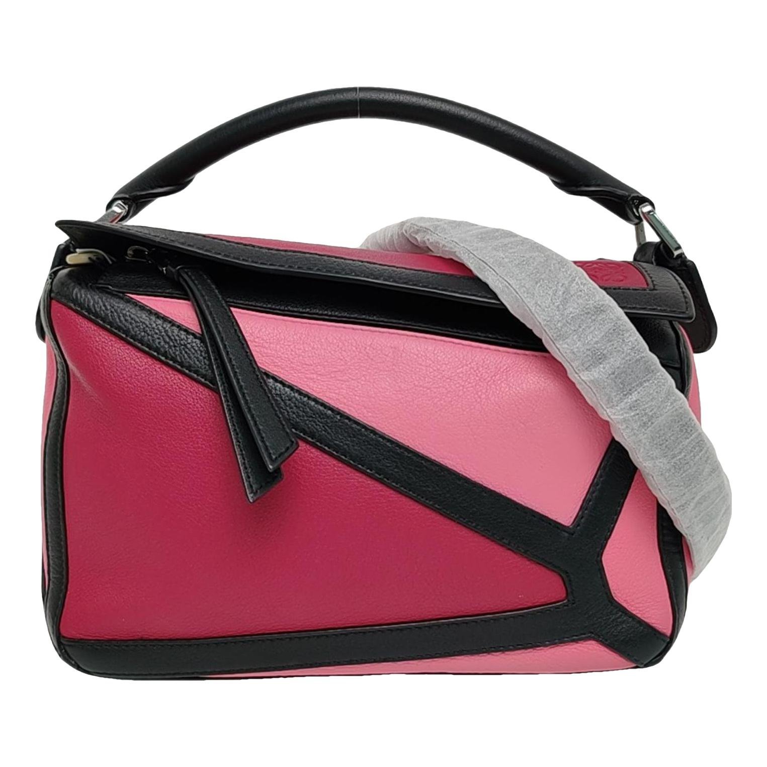 Puzzle leather handbag