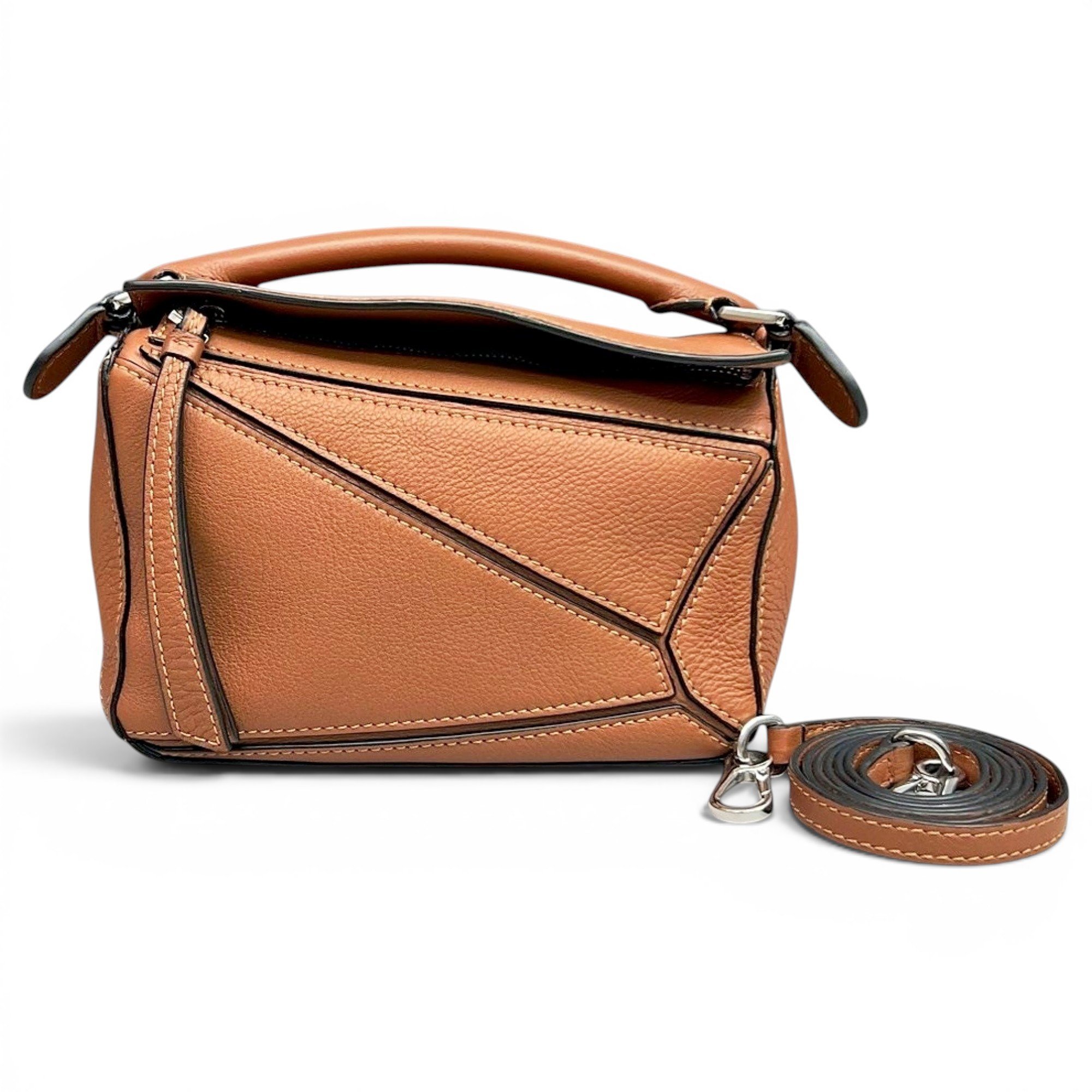 Puzzle leather handbag