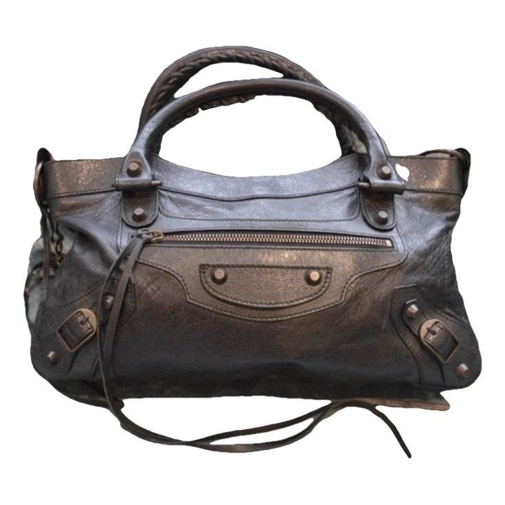 First leather handbag