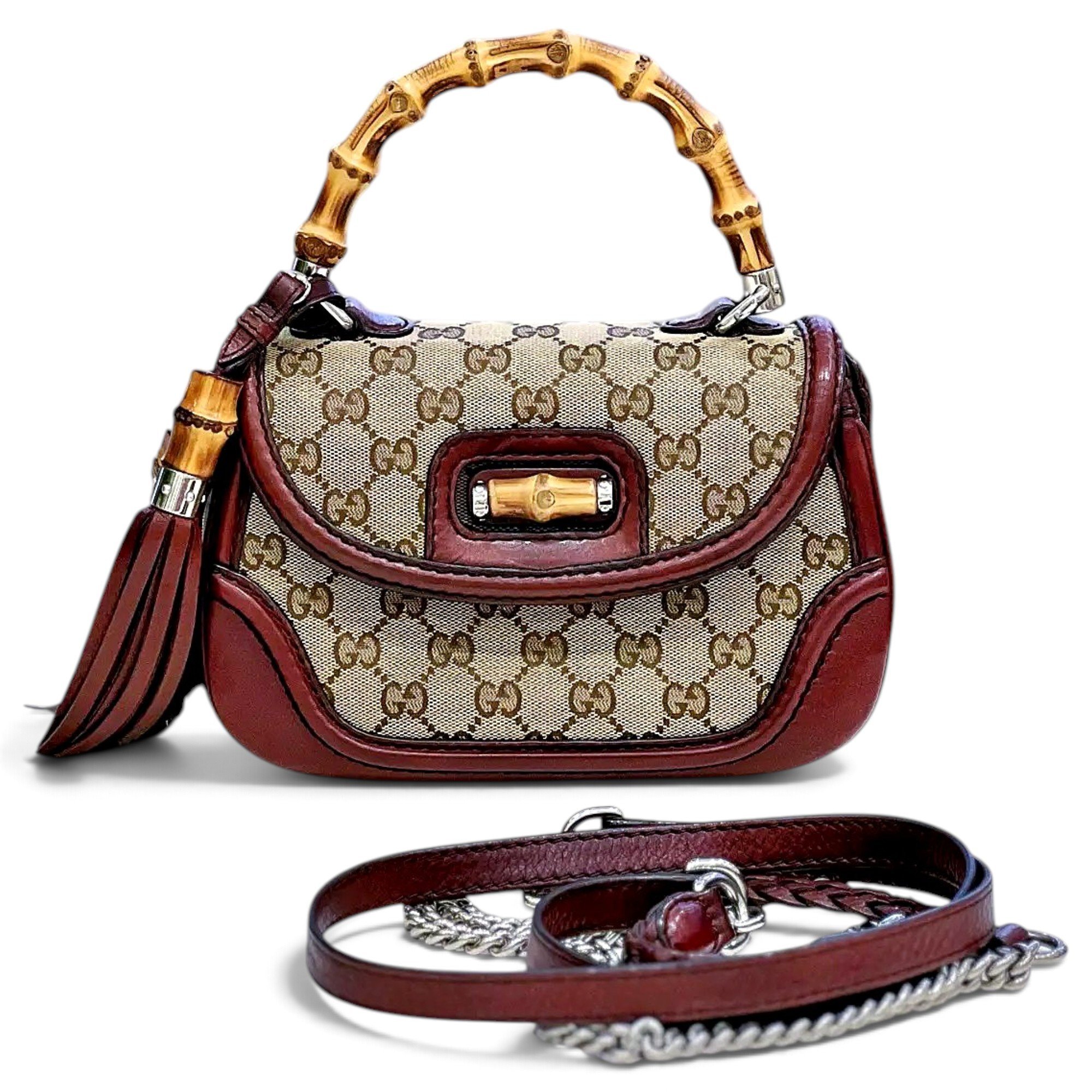 Convertible Pompon Bamboo Top Handle leather crossbody bag