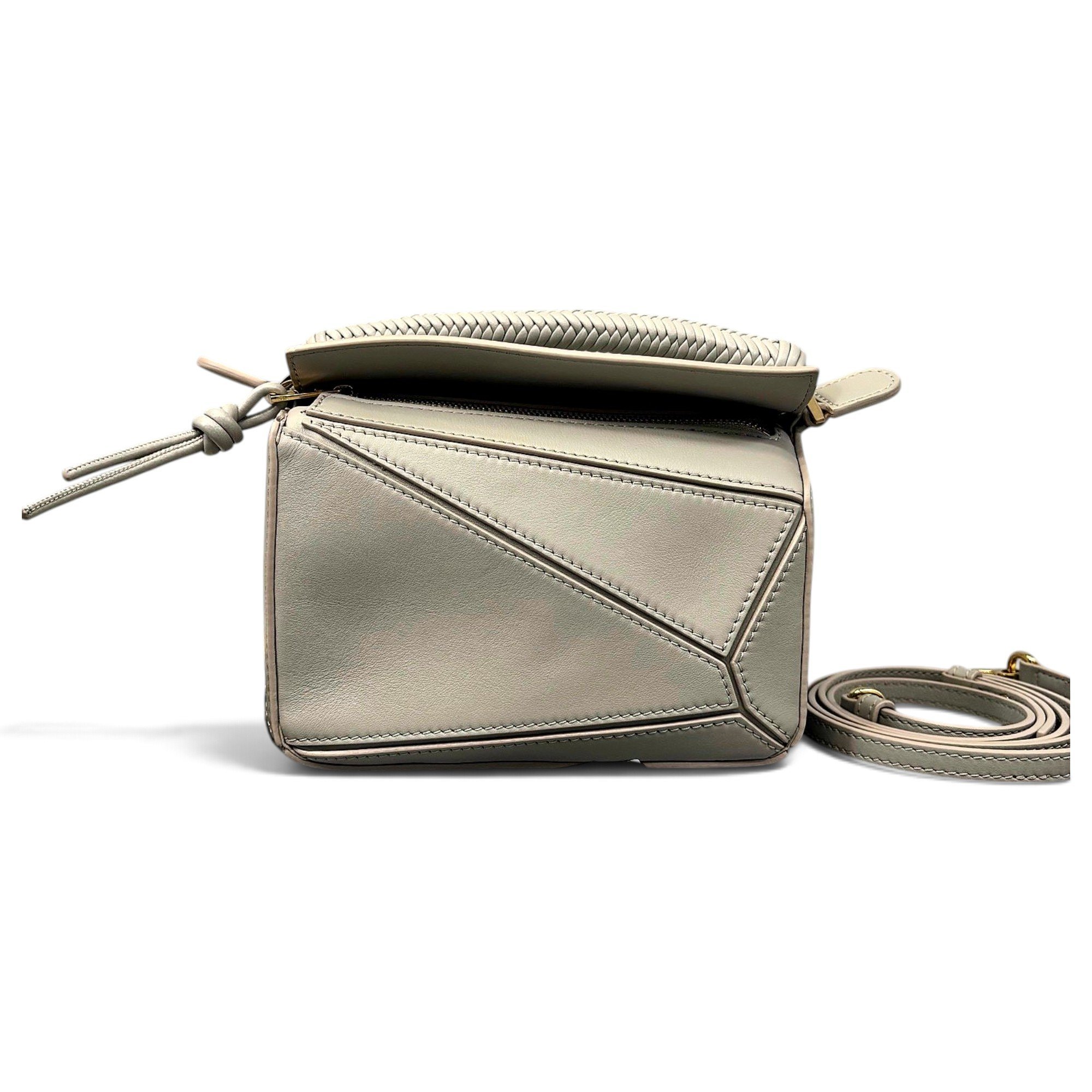 Puzzle leather handbag
