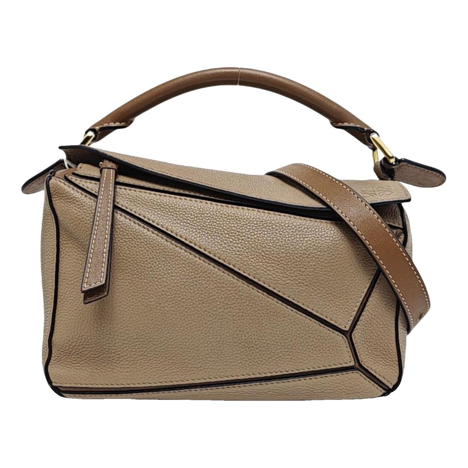 Puzzle leather handbag