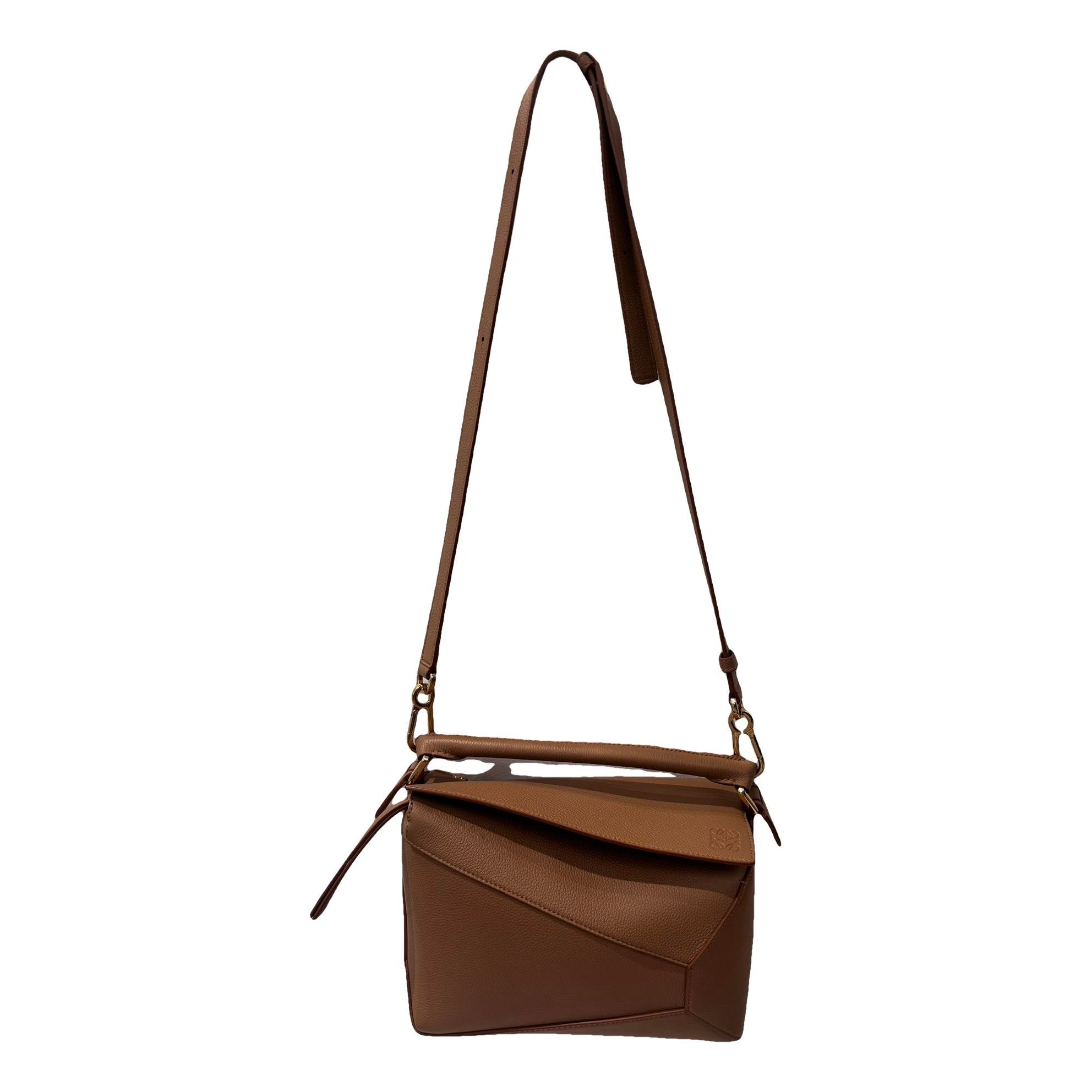 Puzzle leather handbag