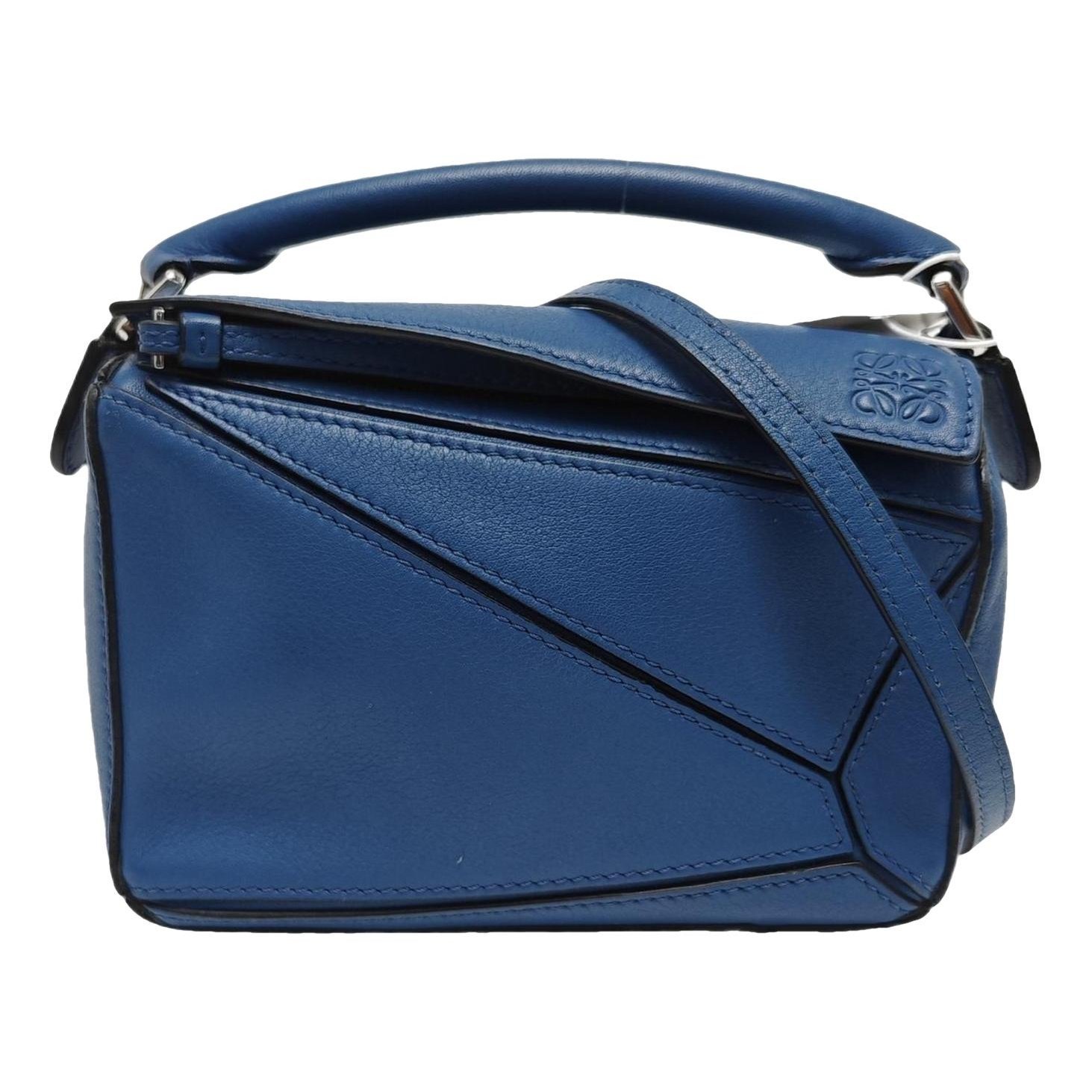 Puzzle leather handbag