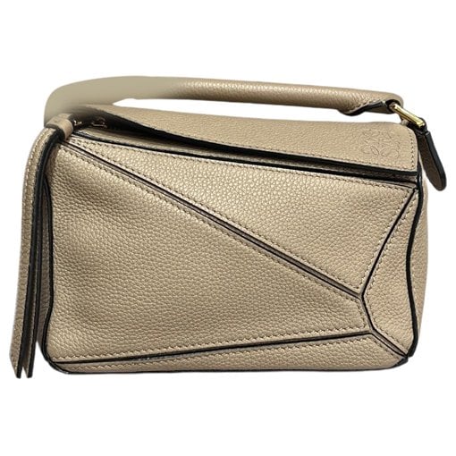 Puzzle leather handbag