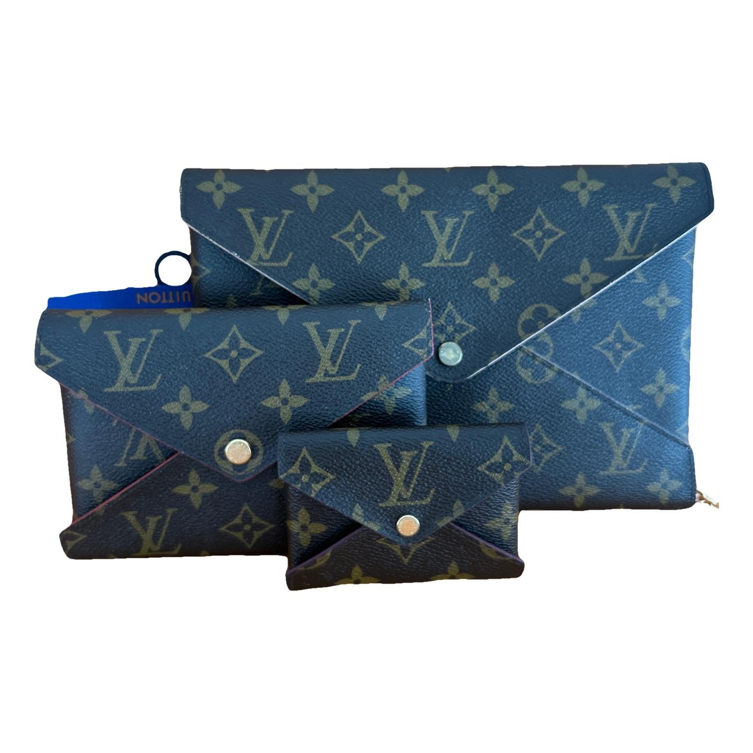 Kirigami leather clutch bag