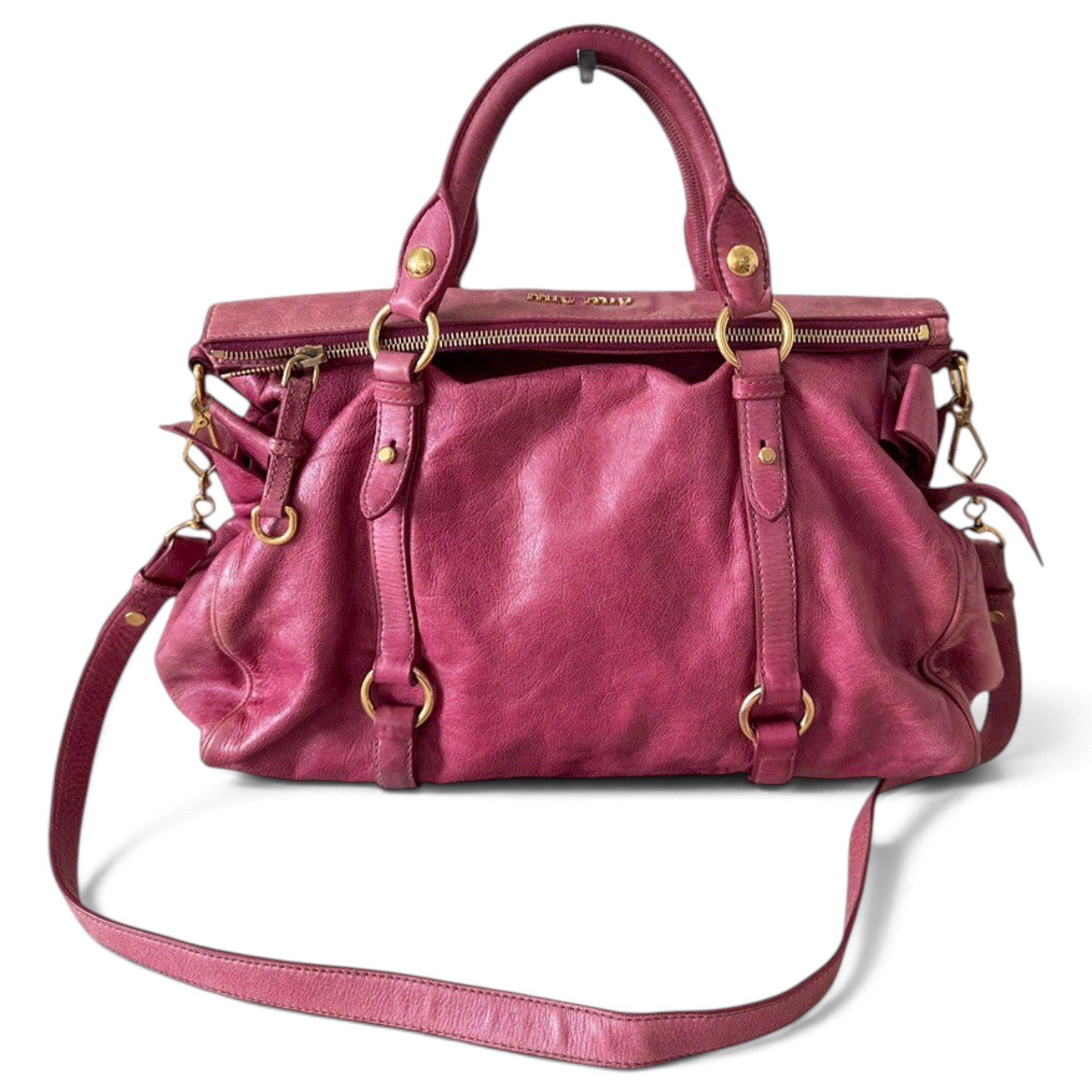 Bow bag leather handbag