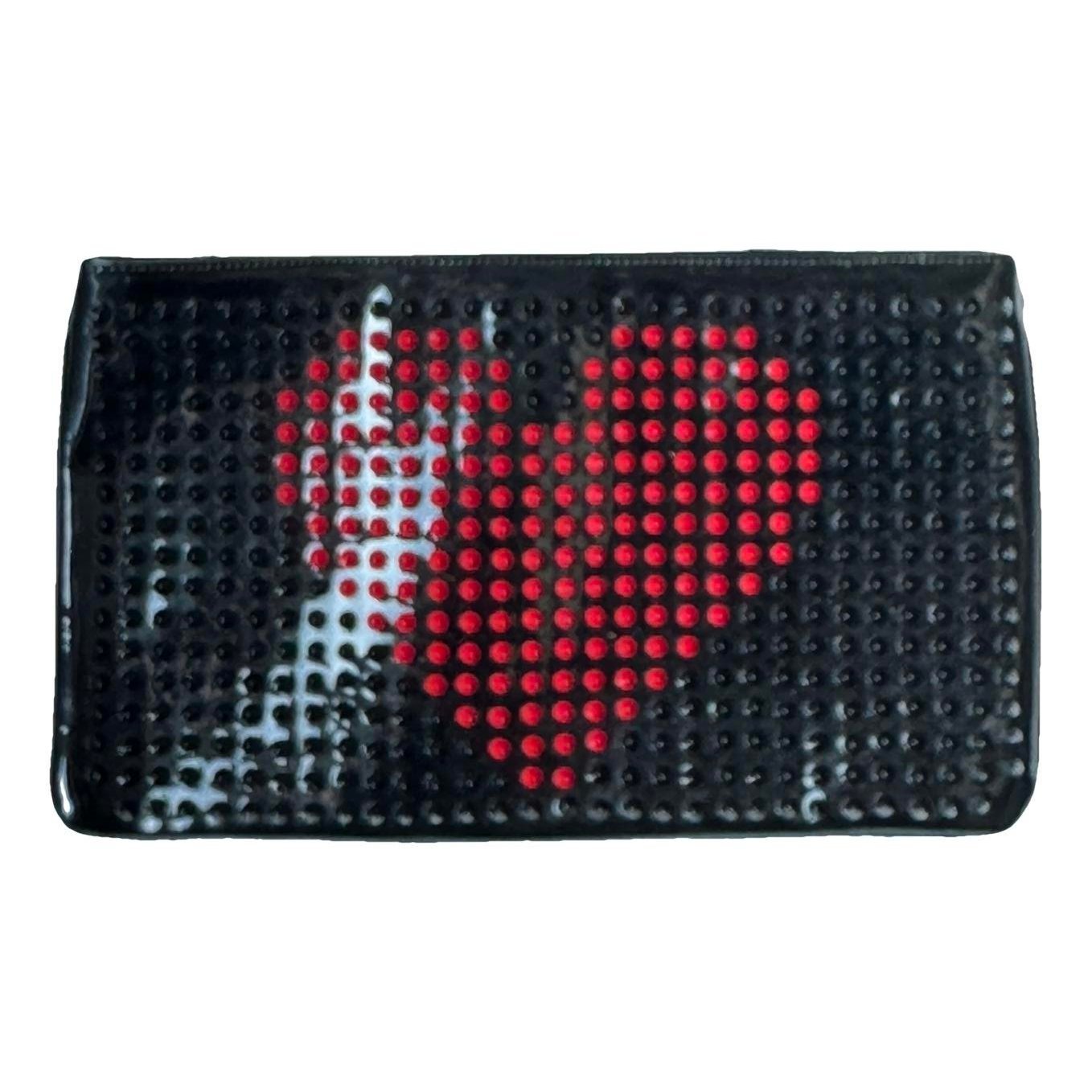 Loubiposh patent leather clutch bag