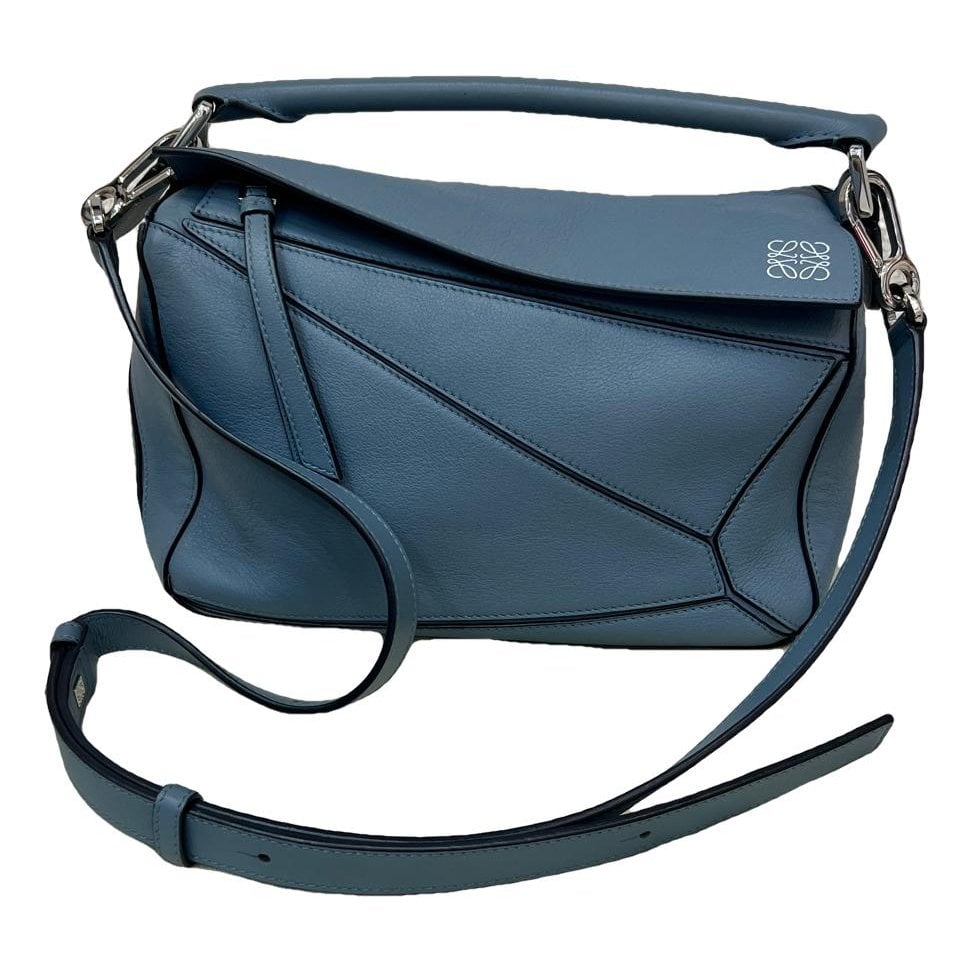 Puzzle leather handbag