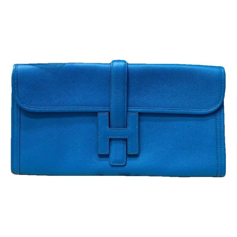 Jige leather clutch bag