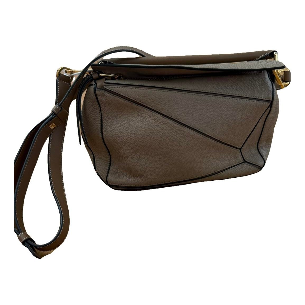 Puzzle leather handbag