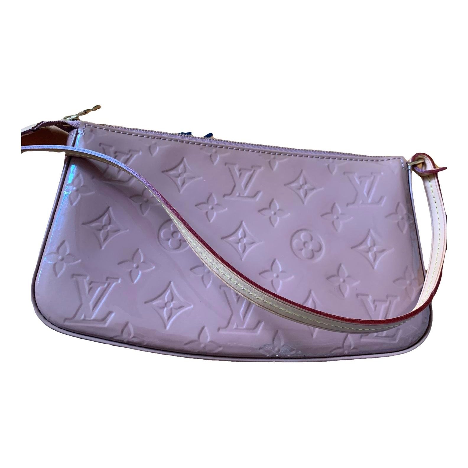 Pochette Accessoire patent leather handbag