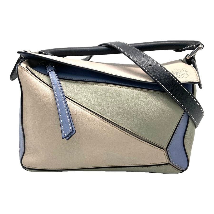 Puzzle leather handbag