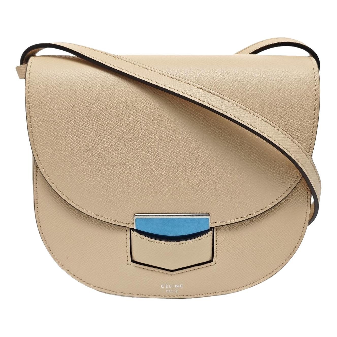 Trotteur leather handbag