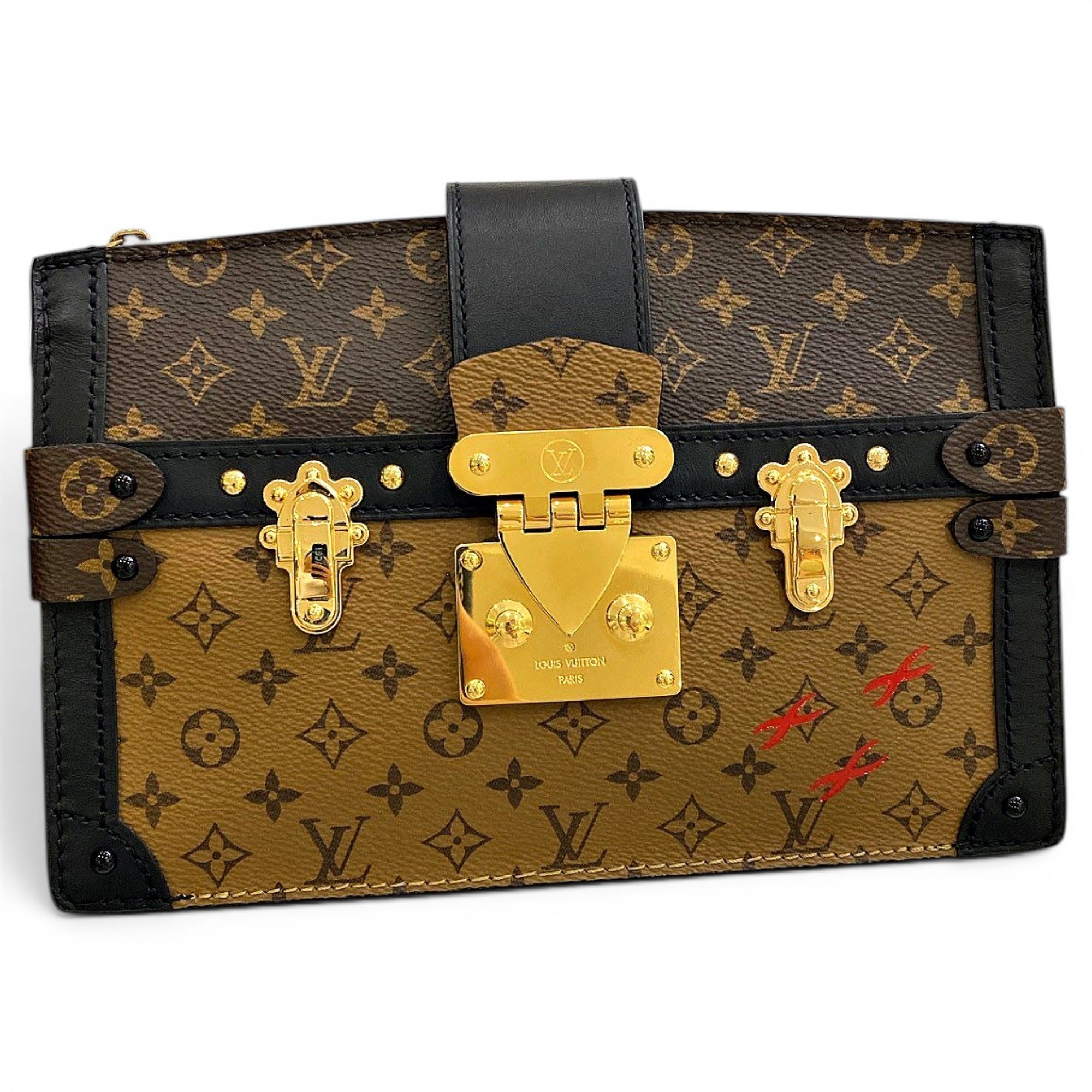 Pochette Trunk leather handbag