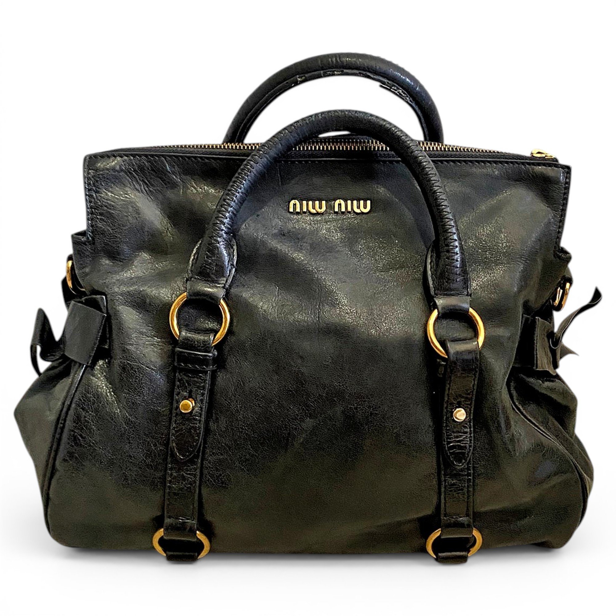 Bow bag leather handbag
