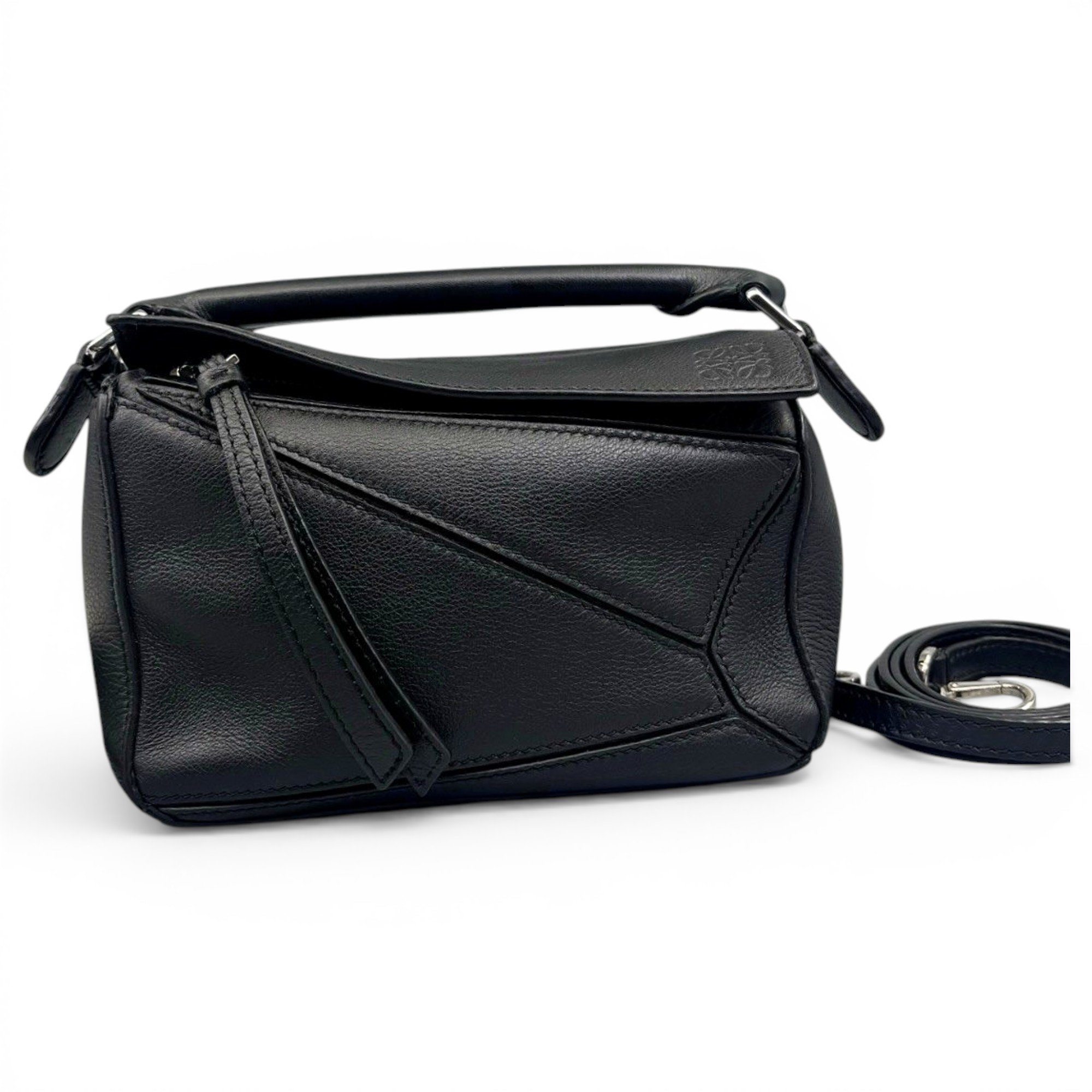 Puzzle leather handbag