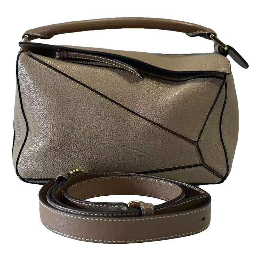Puzzle leather handbag