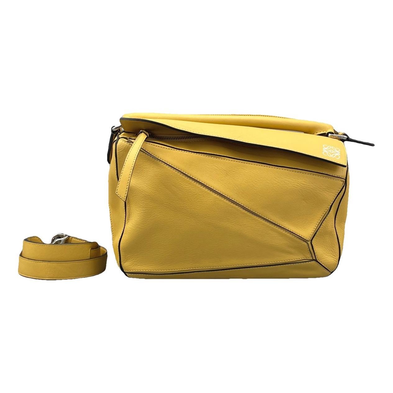 Puzzle leather handbag