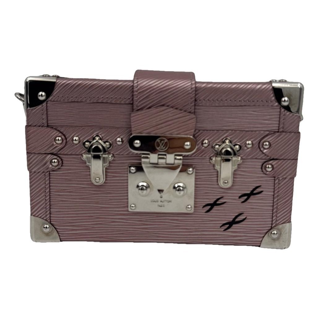 Pochette Trunk leather handbag