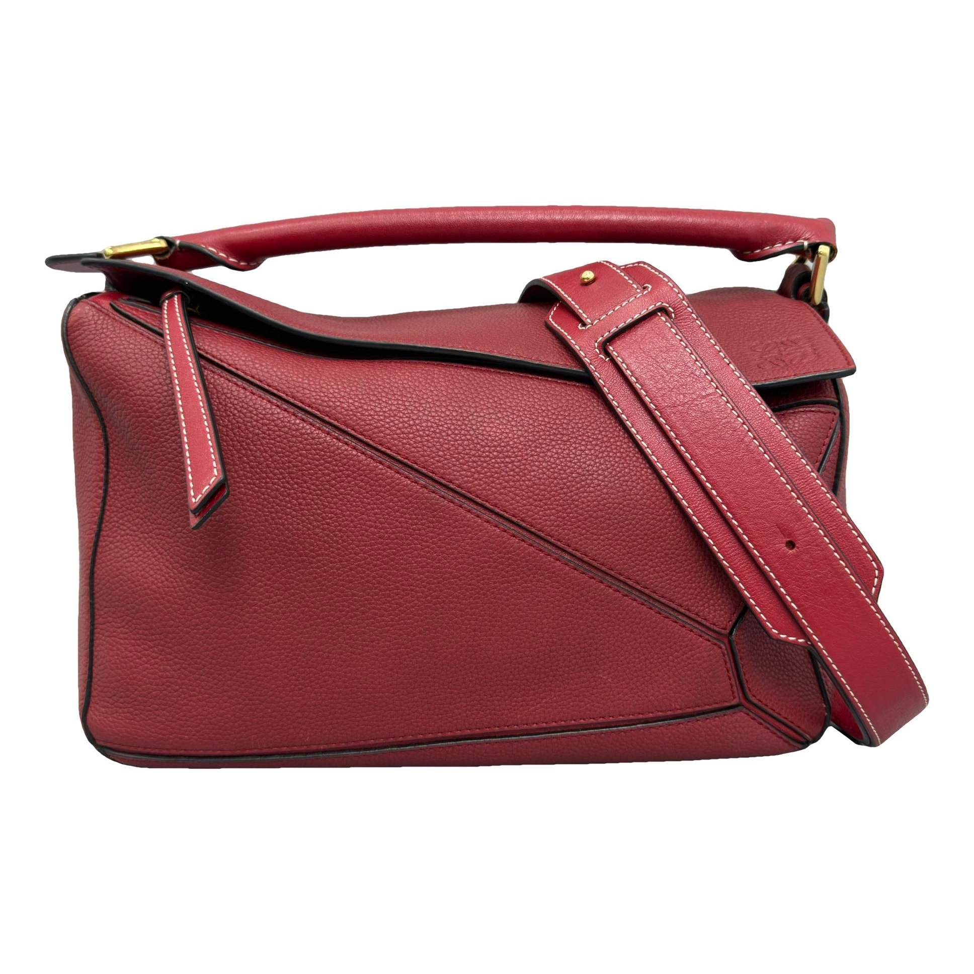 Puzzle leather handbag